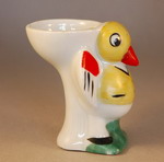 1930s Egg Cup modelled as a stylised chick wearing a waistcoat