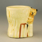 1950s Egg Cup modelled as Sooty playing cricket