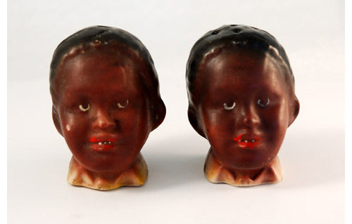 Pair of cruets formed as black children's heads