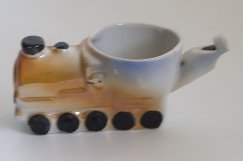 A 1920s Scarce Whistle Egg Cup Modelled as a Steam Train -Sold