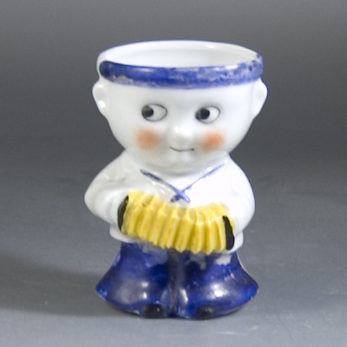 1930s Rocking Eggcup modelled as a Sailor Boy & Accordian (Sold)